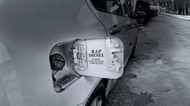 Fuel-filler flap with 'RIP diesel' written on it